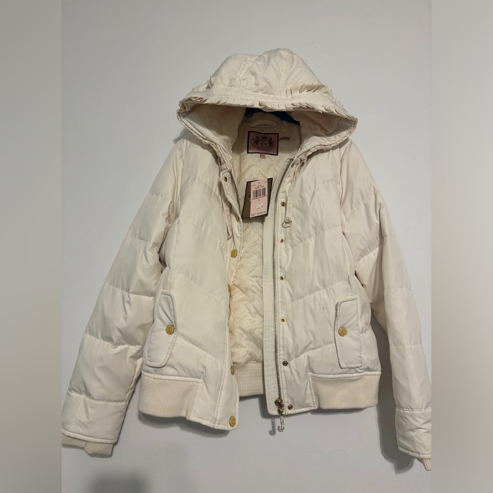New Juicy Couture puffer Jacket- new with tags! Size XL fits like a women xs/s!